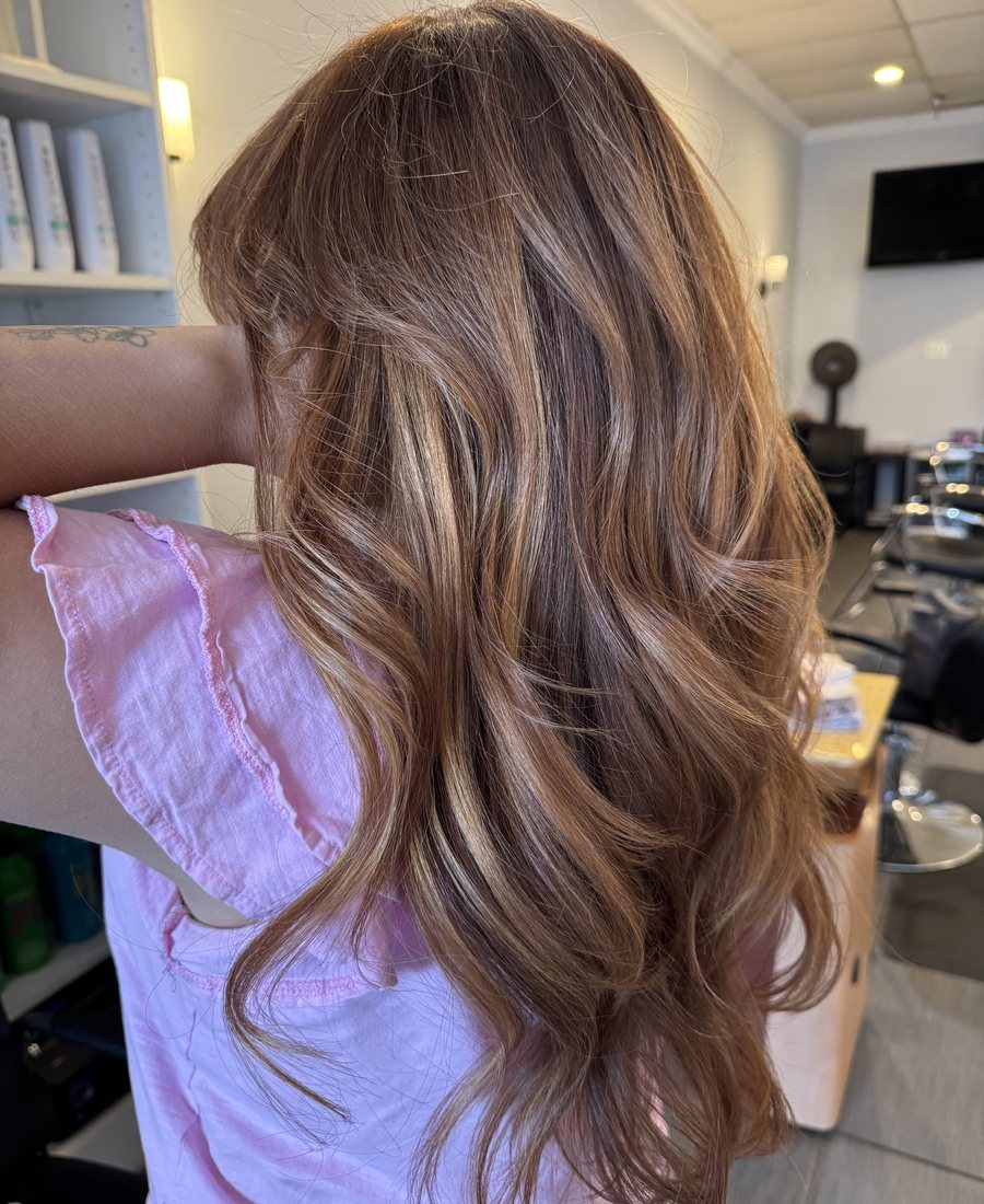A polished hair result photographed inside Hair Xpressions in Fairfax