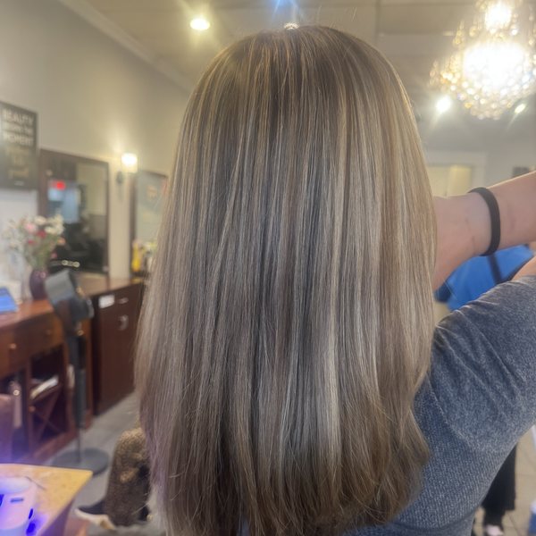 Glossy cool brunette hair with a smooth salon finish