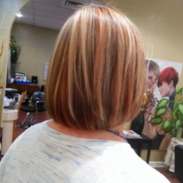 Glossy bob haircut at Hair Xpressions