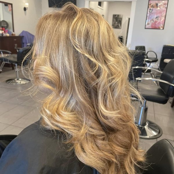 Styled curls photographed inside the salon