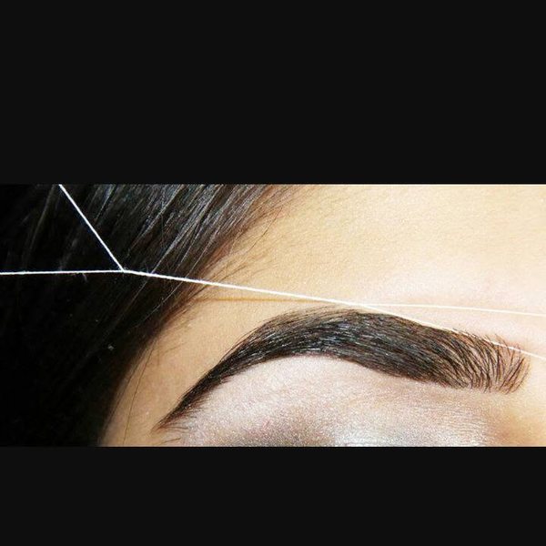 Eyebrow shaping detail at Hair Xpressions
