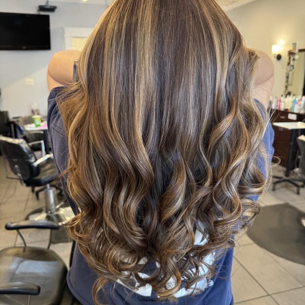 Dimensional curls and highlights at Hair Xpressions