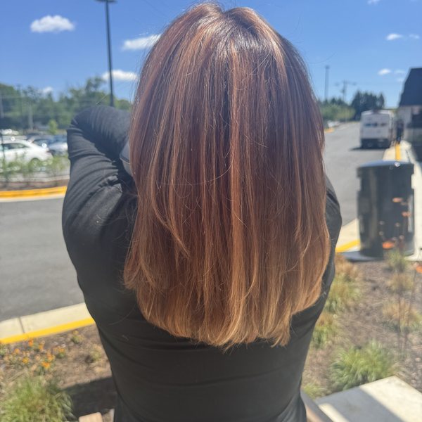 Smooth shoulder-length cut with soft layers