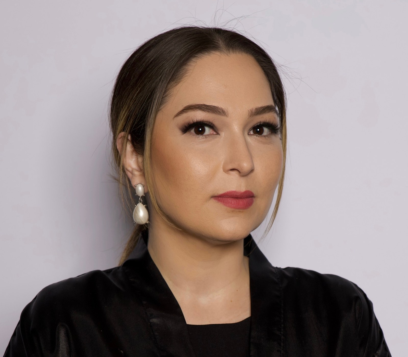 Portrait of Norra, stylist at Hair Xpressions